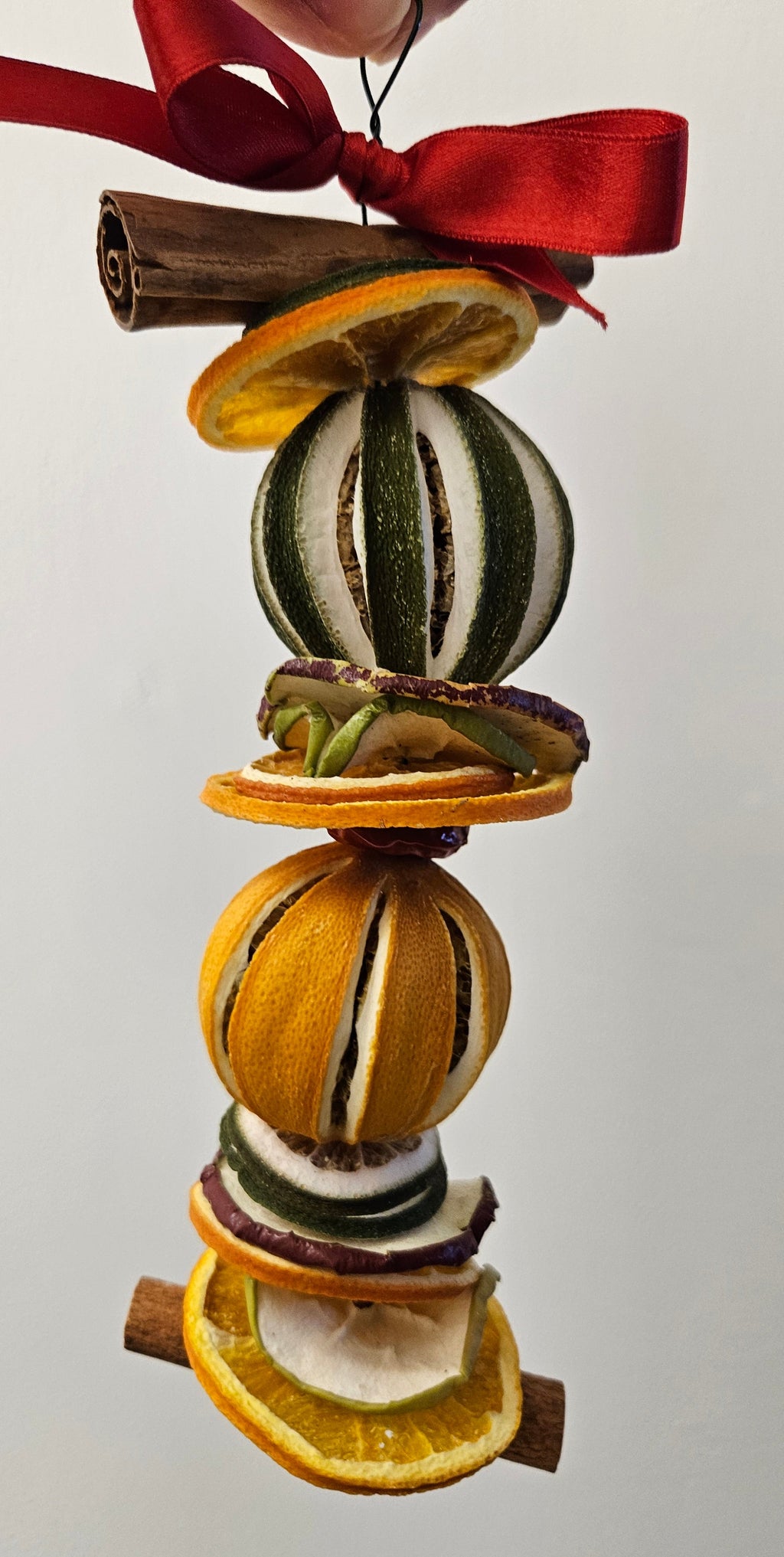 Dried fruit and cinnamon hanging garlands